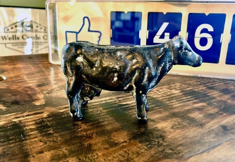 The cast-iron cow on the restaurant counter