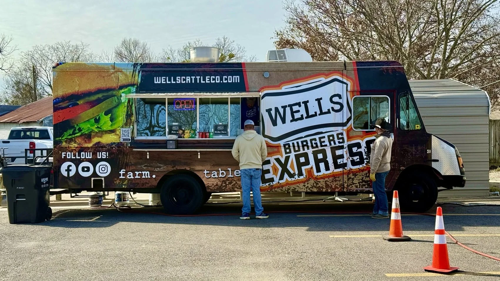 The Wells Burgers Express food truck serving a farm-to-table window